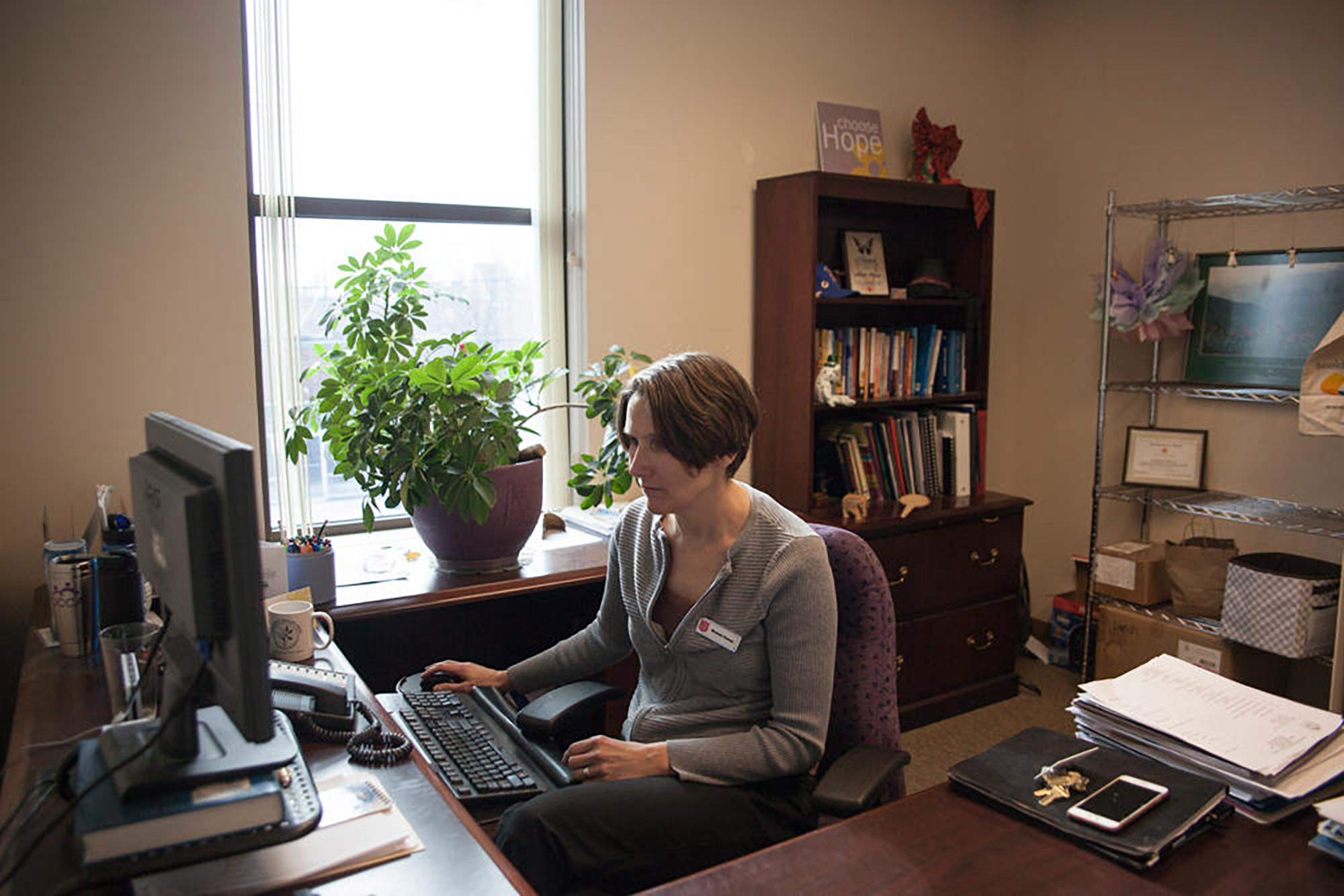 Michele Hannan works at a computer in her office.