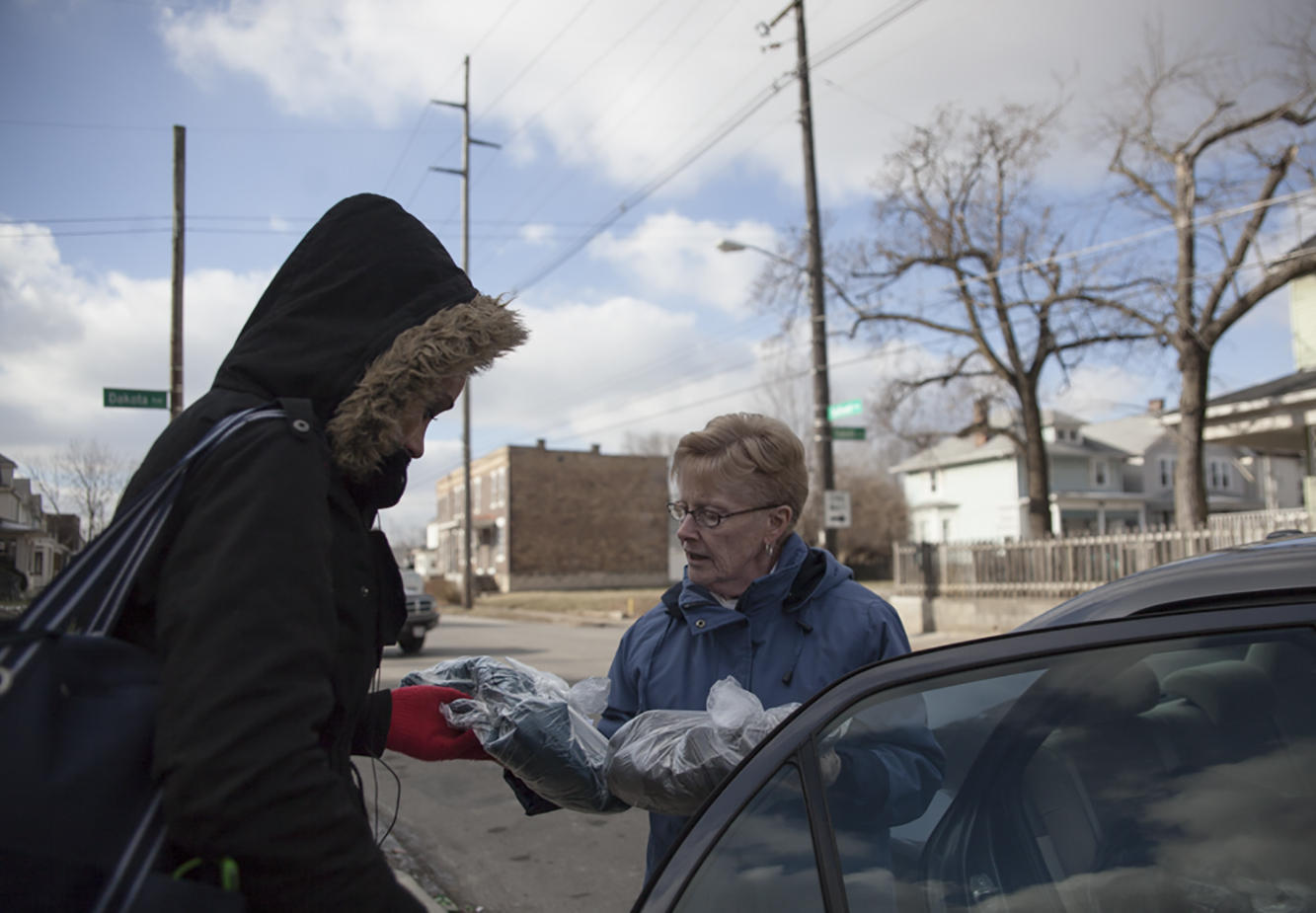 Sister Nadine Buchanan hands out lunches.